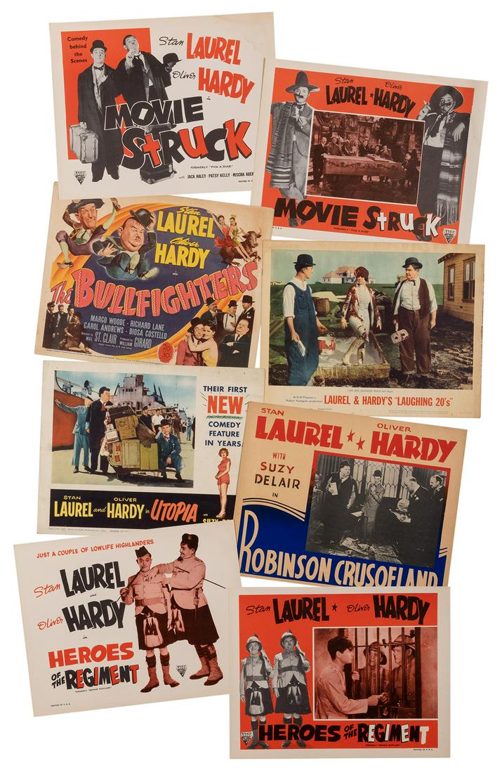 Laurel & Hardy Lobby Cards. Group of Over 25. Color: Laurel & Hardy Lobby Cards. Group of Over 25. Color lobby cards for Nothing But Trouble (1945); The Big Noise (1944; severely damaged with large losses to corner); Robinson Crusoeland [set of 8; from 
