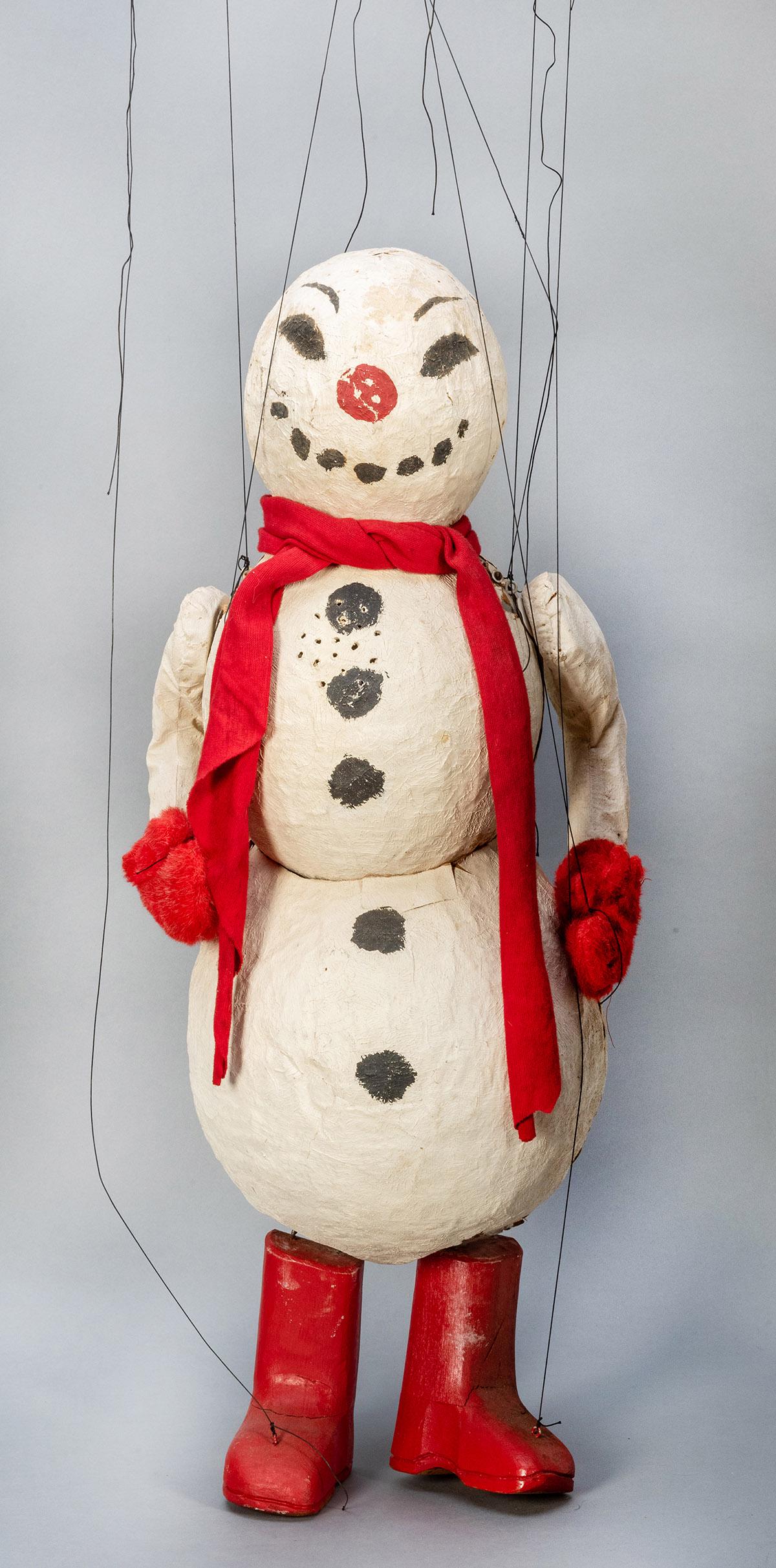 Folk Art Snowman Marionette. American, mid-20th: Folk Art Snowman Marionette. American, mid-20th century. Handmade papier-mache snowman marionette with plush mittens, fabric scarf, painted body, and boots. Strung to old wooden control bars. Maker un