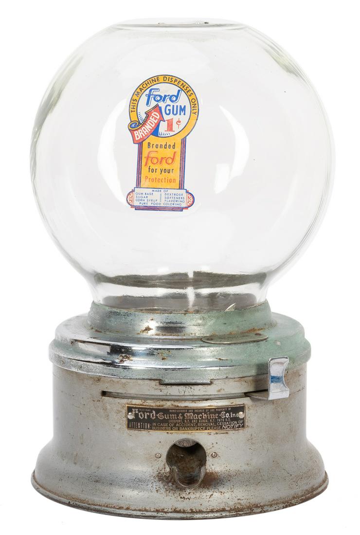 Ford Gum 1 Cent Gum Ball Machine. Ford Gum & Machine: Ford Gum 1 Cent Gum Ball Machine. Ford Gum & Machine Co., ca. 1950s. Metal base retains manufacturer’s plaque, coin slot numbered “232632.” With Ford Gum decal. With lock and key. He