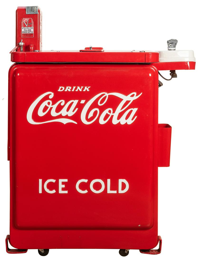 Vendo Model 23 Coke Machine (10c) with Porcelain: Vendo Model 23 Coke Machine (10c) with Porcelain Drinking Fountain. With glass Coke bottles in cooler. 32 x 18 ½ x 44 ½”. Fully restored and working. Uncommon design.