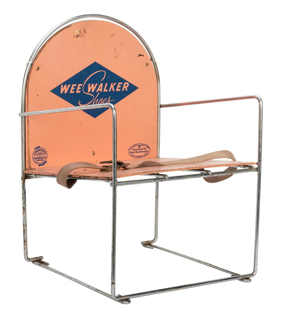 Wee Walker Shoe Store Advertising Display. 1950s. Tiny: Wee Walker Shoe Store Advertising Display. 1950s. Tiny metal chair with pink seat and backrest, the latter printed in blue to advertise Wee Walker Shoes. Height 16 ¾”. Insignificant wear; g