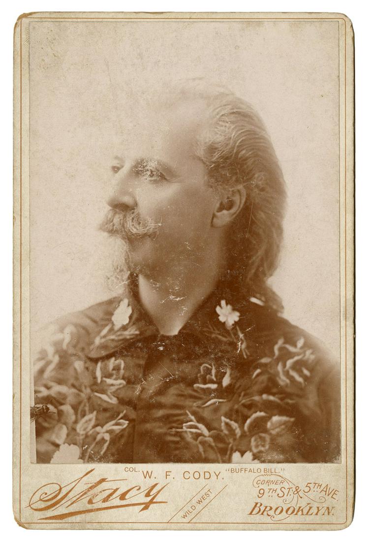 Cody, William F. Buffalo Bill Cabinet Photo. Circa: Cody, William F. Buffalo Bill Cabinet Photo. Circa 1880s/90s. Bust photograph of Cody in floral Western shirt, by Stacy (Brooklyn), mount imprinted with Cody’s name. Facsimile signature of Cody 