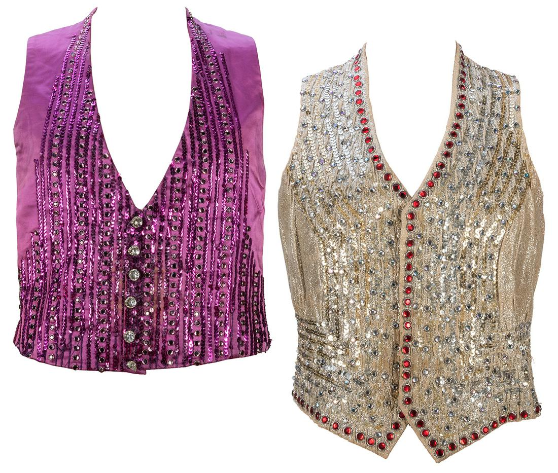 Pair of Circus Vargas Joe Pon Ringmaster Vests. Pair of: Pair of Circus Vargas Joe Pon Ringmaster Vests. Pair of rhinestone decorated vests, cream and purple, made by Brooks Van Horn and Vincent Costumes (designed by Winn Morton), owned and worn by Joe Pon.