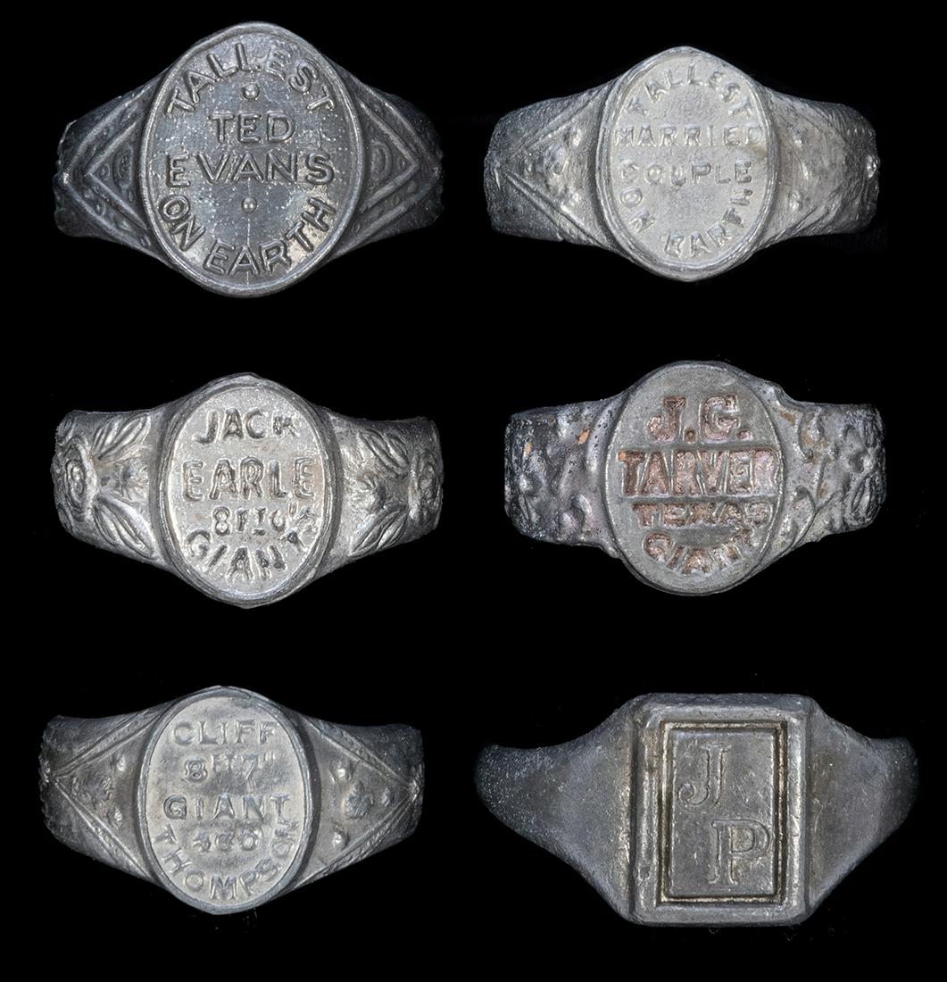 Lot of 6 Circus Giants and “Tallest Men on Earth”: Lot of 6 Circus Giants and “Tallest Men on Earth” Rings. Extra large metal rings of circus and carnival giants, including Johann Petursson, Cliff Thompson, J.G. Tarver, Jack Earle, Ted Eva