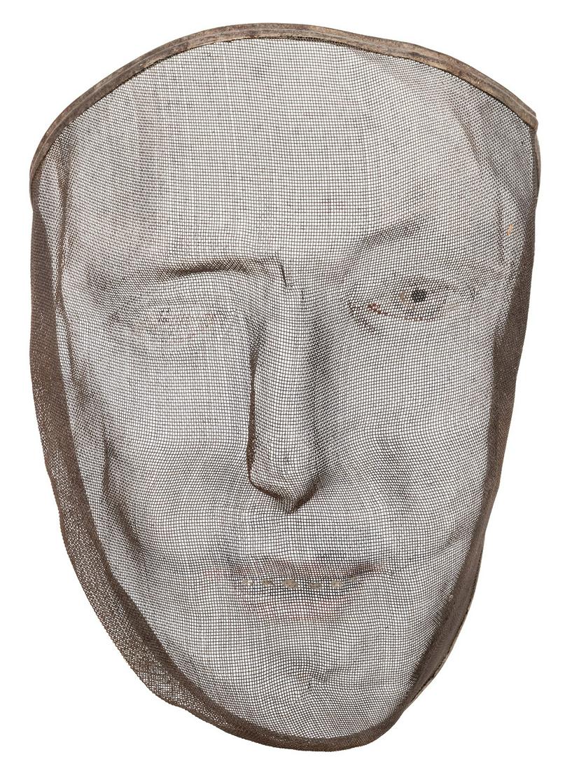 Odd Fellows / Secret Society Wire and Mesh Mask. Circa: Odd Fellows / Secret Society Wire and Mesh Mask. Circa 1900s. Shaped wire and mesh mask with painted lips, eyes, and teeth. 8 x 6 x 3”. Misshapen in a few areas, otherwise very good.