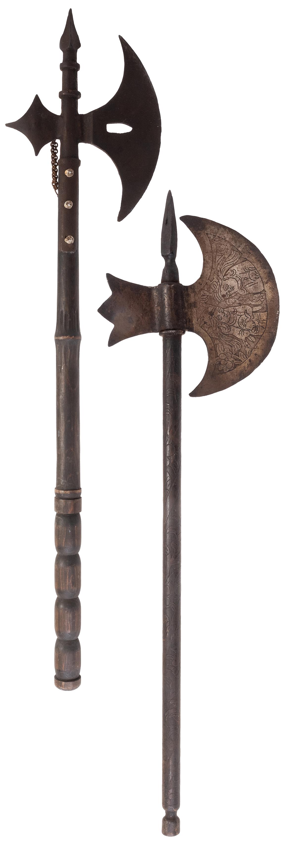 Pair of Persian Battle Axes. 20th century. Engraved and: Pair of Persian Battle Axes. 20th century. Engraved and turned handles, one with engraved Persian decoration on blade. Longer example 30 ¼”.