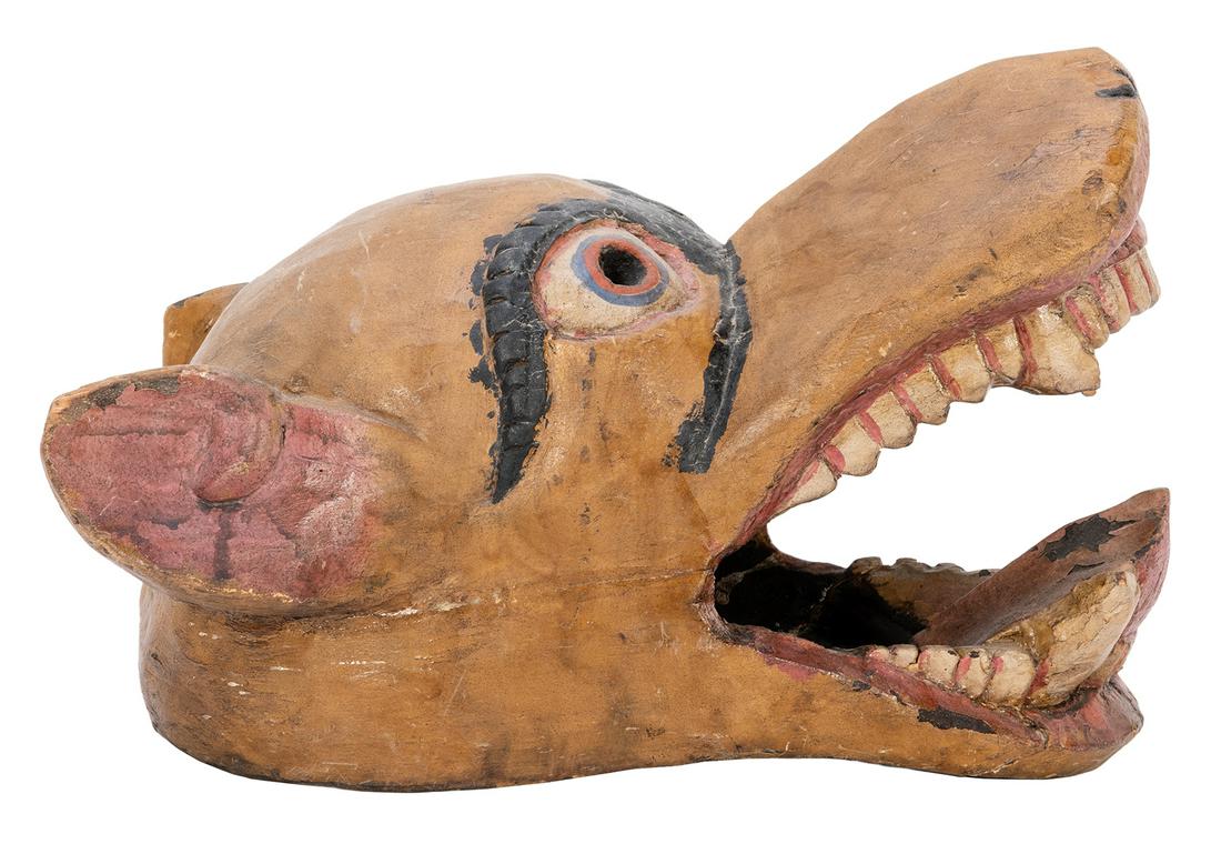 Carved Mexican Festival Mask. Early example with hand: Carved Mexican Festival Mask. Early example with hand painted and carved features of a dog-like creature. Length 10”. Few small splits around edges with old repairs.