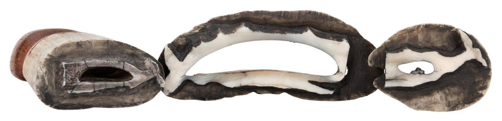 [POLAR–WHALING] Three Scrimshaw Whaling Log Stamps.: [POLAR–WHALING] Three Scrimshaw Whaling Log Stamps. Each with carved images of whales used to report whale sightings; one with wooden handle. Largest length, 2 ¾". Old ink residue to stamps.