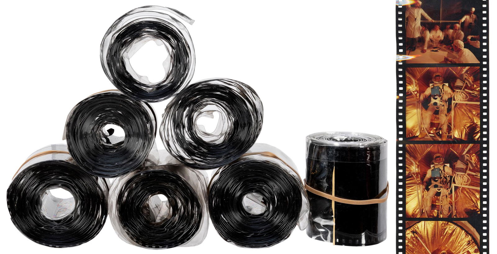 [SPACE] Eight Original NASA Related 70mm Film Strips.: [SPACE] Eight Original NASA Related 70mm Film Strips. Circa 1960s. Each strip contains over 30 colorful images including several of David Scott in a spacesuit, NASA offices, views from the cockpit, ae