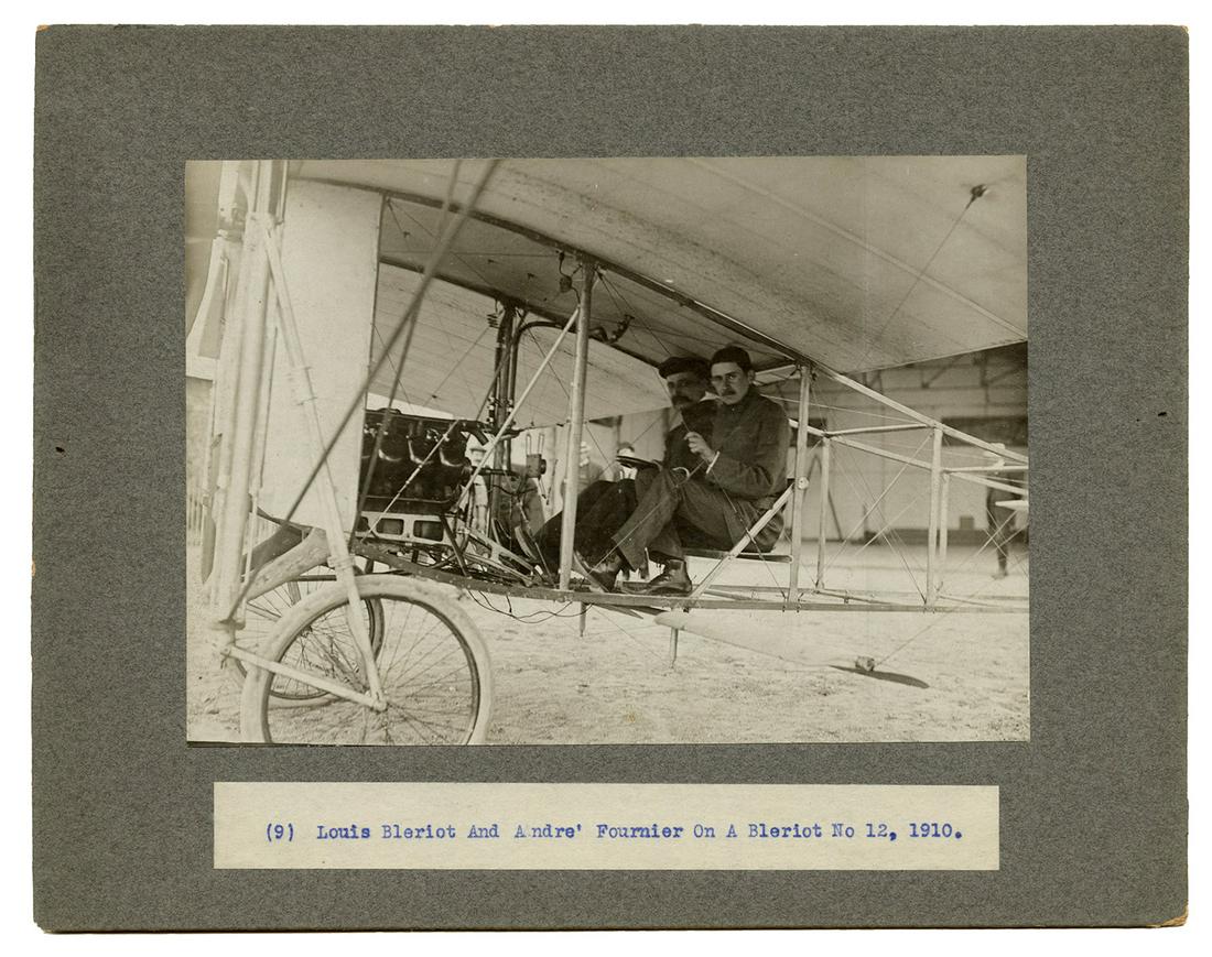 BLERIOT, Louis (1872-1936) Louis Bleriot and Andre: BLERIOT, Louis (1872-1936) Louis Bleriot and Andre Fournier Photograph. 1910. Photograph of French pioneering aviators Louis Bleriot and Andre Fournier on a Bleriot No. 12 airplane. 6 ½ x 4 ½" mount