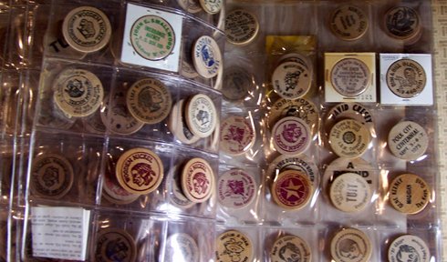 An accumulation of over 320 wooden nickels mounted - 3
