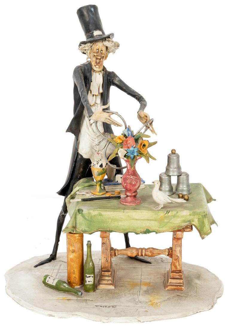 Moretto, Toni (Italian, 1929 â€“ 2011). Linking Rings: Moretto, Toni (Italian, 1929 â€“ 2011). Linking Rings Magician Sculpture. Italy: Lo Scricciolo, ca. 1995. Caricaturish porcelain sculpture of a magician standing behind his table laden with cards