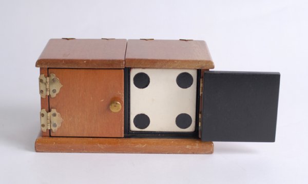 Die Box by F.G. Thayer & Co., ca. 1940. : Die Box. Los Angeles, F.G. Thayer & Co., ca. 1940. The classic sucker effect wherein a 3" square die vanishes from a wooden cabinet after much by-play, only to be reproduced from a formerly empty hat.