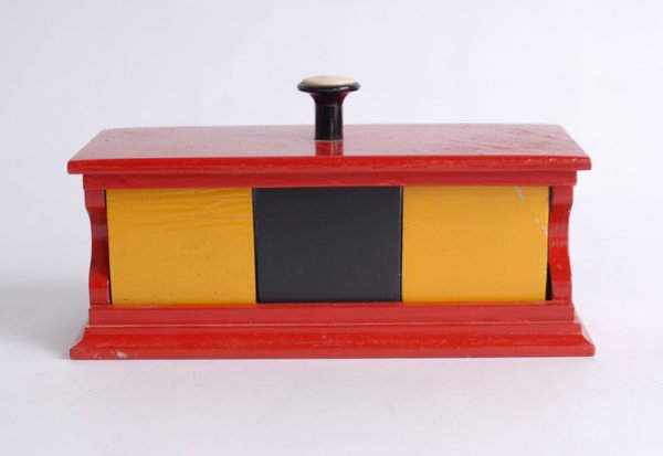 Squeezeaway Block by E. M. Massey, ca. 1947. : Squeezeaway Block. E. M. Massey, ca. 1947. An open framework containing three blocks – two yellow and one black – allows the performer to visibly 'squeeze' the center, black block into nothingness