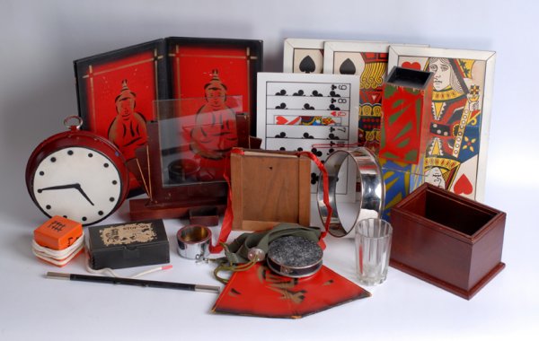A collection of stage magic apparatus and props.: [Stage Magic] Collection of stage magic apparatus and props. Including specially manufactured wooden, metal and glass apparatus for over 40 effects, including Locking Double-Load Handkerchief Box (Tha