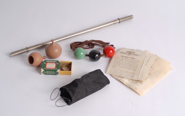 Collection of seven Thayer magic gimmicks and prop: [Thayer Magic] Collection of seven Thayer magic gimmicks and props. Including two Nikko devices (two sizes; for vanishing and producing handkerchiefs, as designed by Harry Kellar and turned by Thayer)