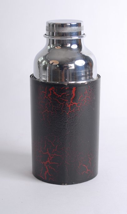 Thermo Canister. Los Angeles, F.G. Thayer, ca. 194: Thermo Canister. Los Angeles, F.G. Thayer, ca. 1940. Chrome-plated brass thermos with crackle-finished metal sleeve. Liquid placed in the canister can be secretly exchanged for dry silks or other obje