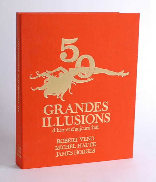 50 Grandes Illusions. Veno, Robert, Michel Hatte a: Veno, Robert, Michel Hatte and James Hodges. 50 Grandes Illusions. Paris, n.d. Publisher's gold-stamped slipcase containing text in French and Hodges' renderings of the workings behind 50 stage illusi