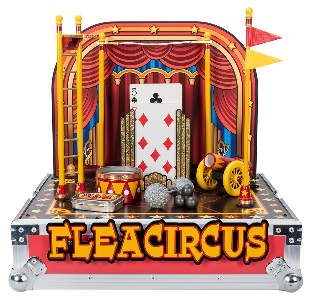 The Flea. West Richland: Wolf’s Magic, 2000s.: The Flea. West Richland: Wolf’s Magic, 2000s. Flags fly off the table, cannons fire, and a selected card rises out of a jumbo deck in this antics filled routine with your performing flea assista