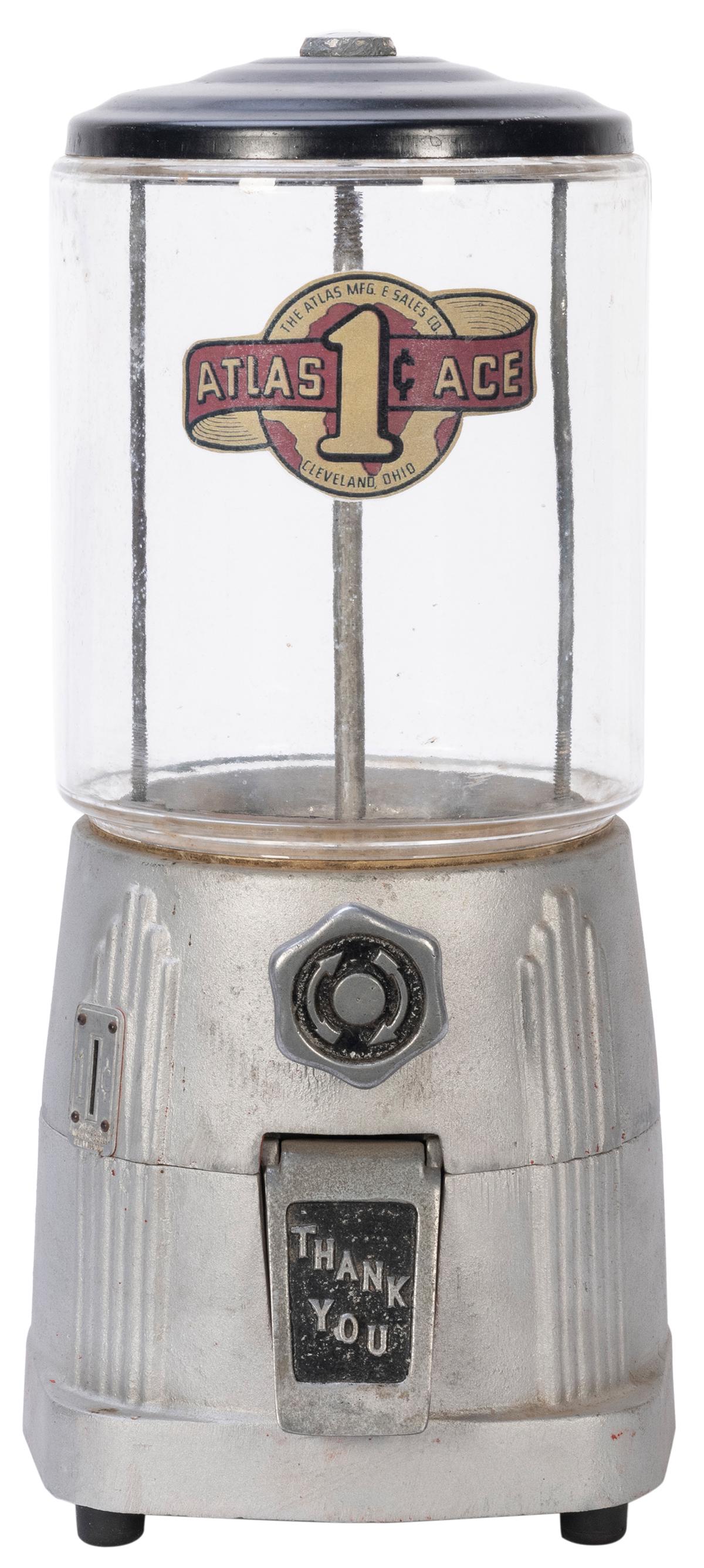 Atlas Mfg. Sales Co. 1 Cent Atlas Deluxe Gumball: Atlas Mfg. Sales Co. 1 Cent Atlas Deluxe Gumball Machine. Cleveland, OH, ca. 1930s. Aluminum body. Height 15”. Lock and key.