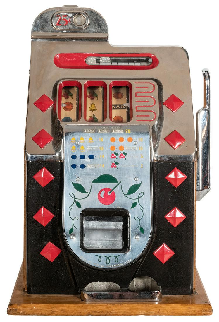 Mills Novelty Co. 25 Cent Diamond Front Slot Machine.: Mills Novelty Co. 25 Cent Diamond Front Slot Machine. Chicago, IL, ca. 1940s. Classic three-reel machine with handsome chrome finish on wooden base. Height 25” Lock and key. Working. Requires th