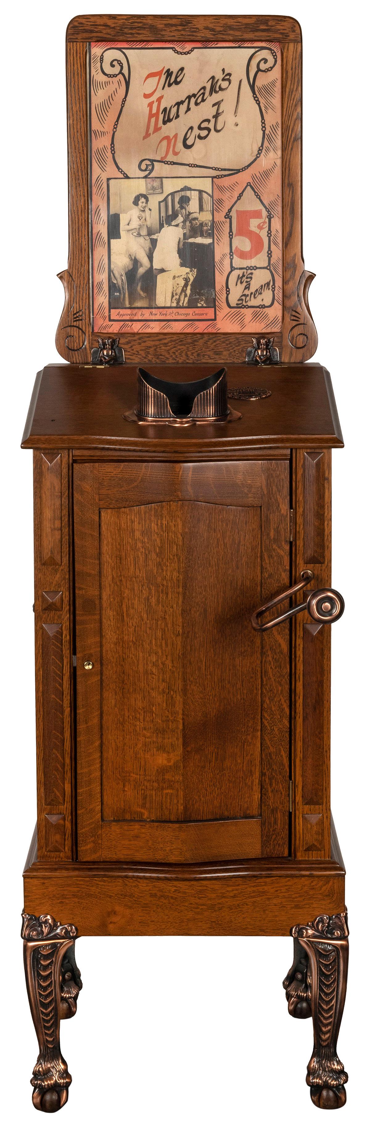 5 Cent Upright Stereoscope Arcade Viewer Machine. Circa: 5 Cent Upright Stereoscope Arcade Viewer Machine. Circa 1900s. Beautifully restored and working coin-operated flip-card viewer machine with wooden cabinet, cast metal claw feet, handles, and cherubs h