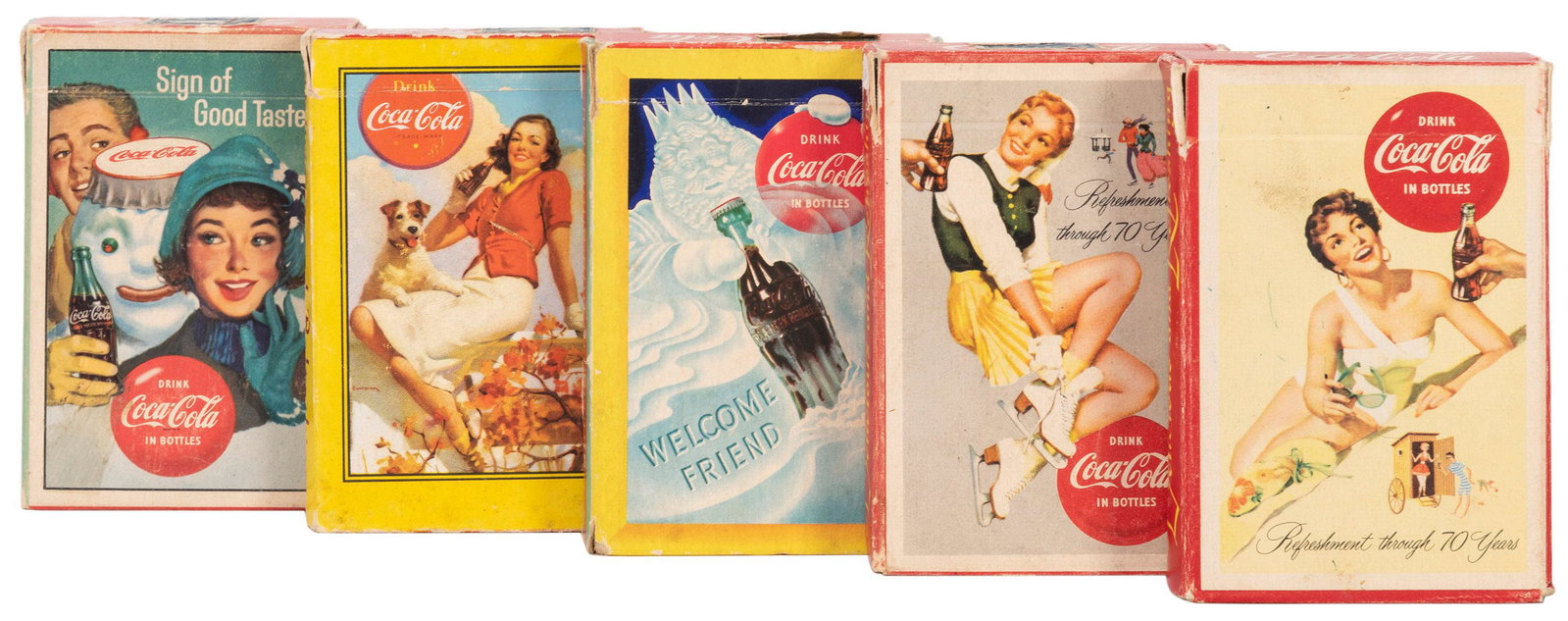 Coca-Cola Playing Cards. Five Decks. 1940s/60s.: Coca-Cola Playing Cards. Five Decks. 1940s/60s. Including girl with terrier; snowman; ice skater; girl/”70 years of refreshment”; and “Welcome Friend” ice king. Three 52 + J + 