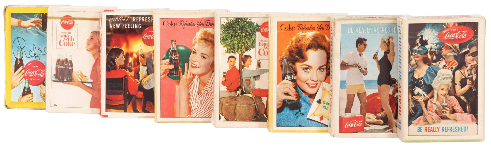 Coca-Cola Playing Cards. Nine Vintage Decks. Bulk: Coca-Cola Playing Cards. Nine Vintage Decks. Bulk 1960s. Various designs, including masquerade party, couple by the fire, surfers, beach party, and others. Two sealed (one with torn cello); all others