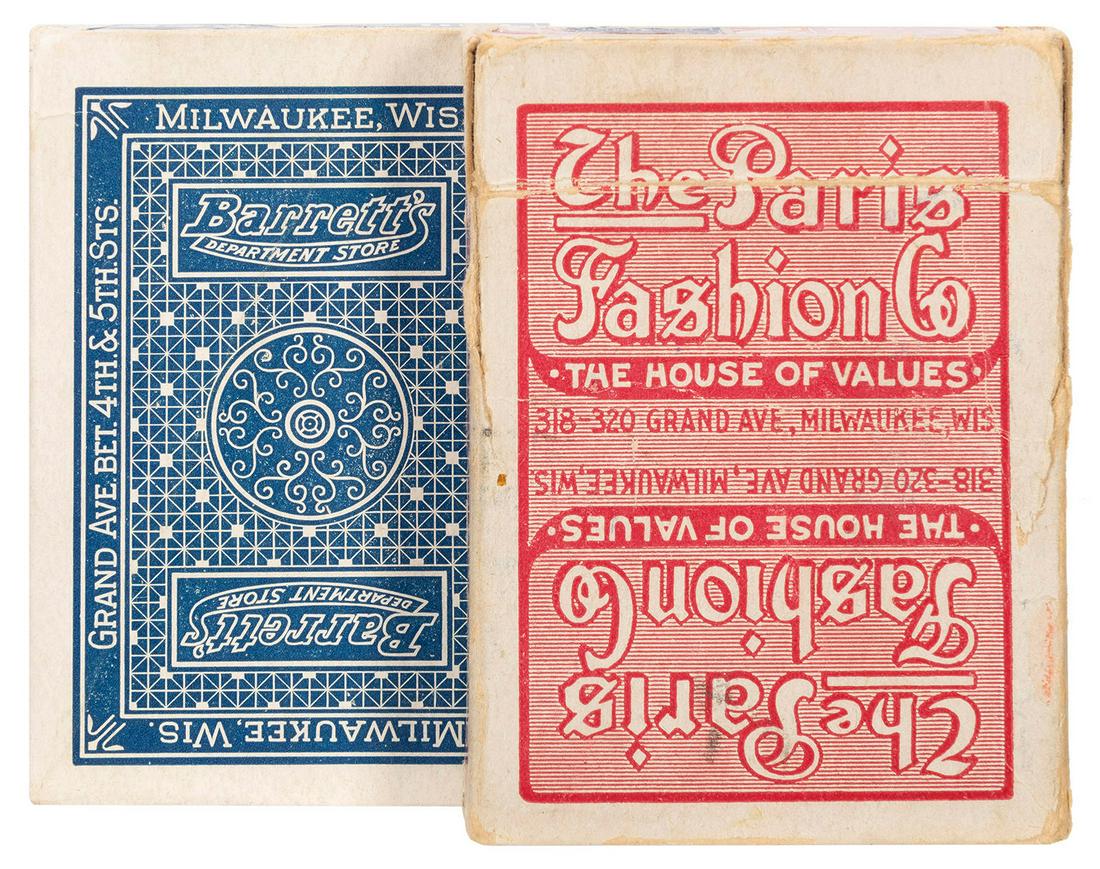 [Milwaukee] Two Antique Milwaukee Advertising Decks.: [Milwaukee] Two Antique Milwaukee Advertising Decks. Circa 1920s. Two decks, advertising Barrett’s Department Store and Paris Fashion Co. Both 52 + J + EC + OB. Advertising on jokers, extra card