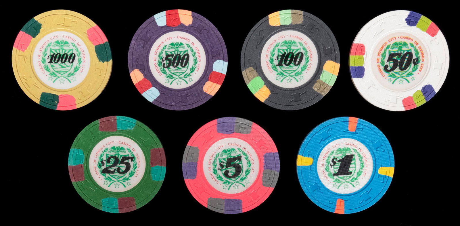 Paulson Casino de Isthmus James Bond Casino Chip Lot.: Paulson Casino de Isthmus James Bond Casino Chip Lot. 94 chips, top hat and cane mold, with the fictional Casino de Isthmus inlay from the 1989 Bond film License to Kill. Includes 50 cents, $1, $5, $2