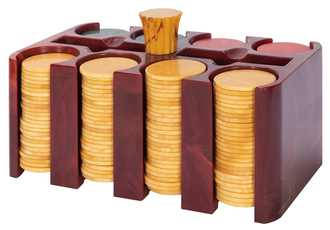 Swirled Bakelite Poker Chip Caddy with Chips. Circa: Swirled Bakelite Poker Chip Caddy with Chips. Circa 1940s. Handsome swirled dark red caddy with yellow handle, holding approximately 210 chips in yellow, red, and midnight green. Caddy with two playin