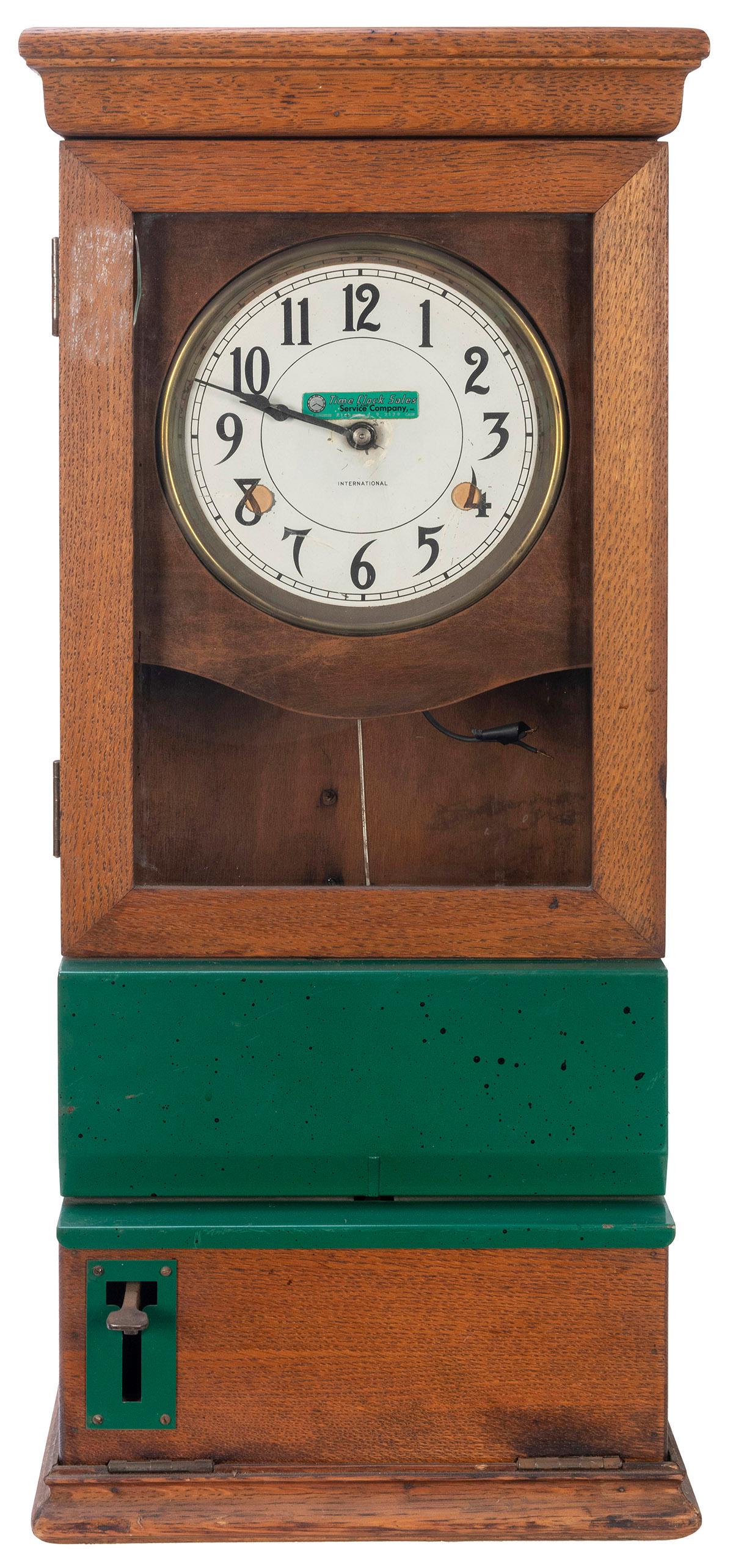 Time Clock Sales & Service Co. Vintage Time Recorder: Time Clock Sales & Service Co. Vintage Time Recorder Clock. Los Angeles. Oak cabinet. 31 x 12 x 12”. Crack in glass at upper left corner. Cabinet door unlocked. No keys. Not tested.