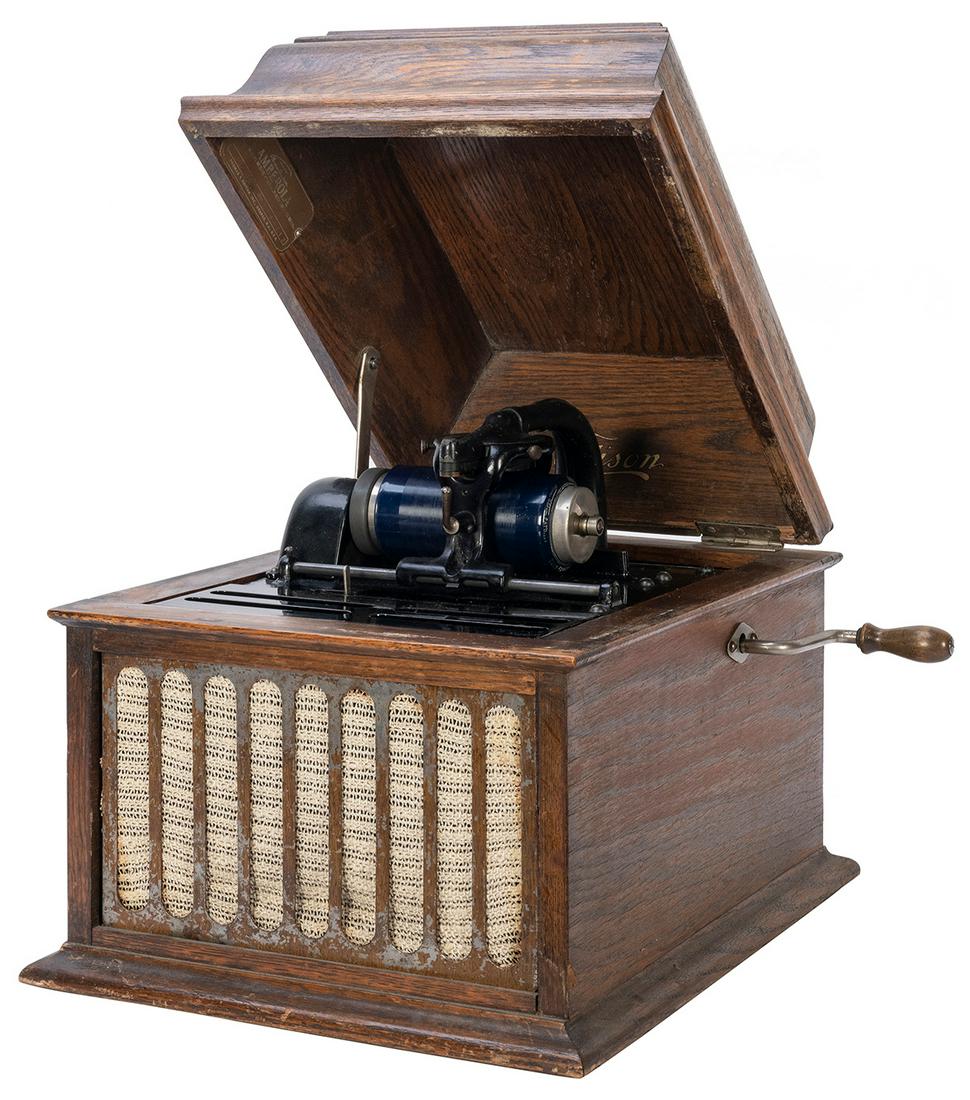 Thomas A. Edison Co. Amberola 30 Wax Cylinder: Thomas A. Edison Co. Amberola 30 Wax Cylinder Phonograph. Orange, NJ, ca. 1910s. Oak case with hinged lid. Contemporary machinery. Wax cylinder included. 12 ½ x 11 ½ x 15 ½”. Wear