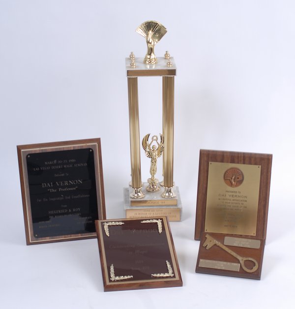 Collection of five awards presented to Dai Vernon.: [Awards] Collection of five awards presented to Dai Vernon. The key to the city of Worcester (presented May 14, 1976), plaques given to Vernon by the Desert Magic Seminar (presented by Siegfried & Roy