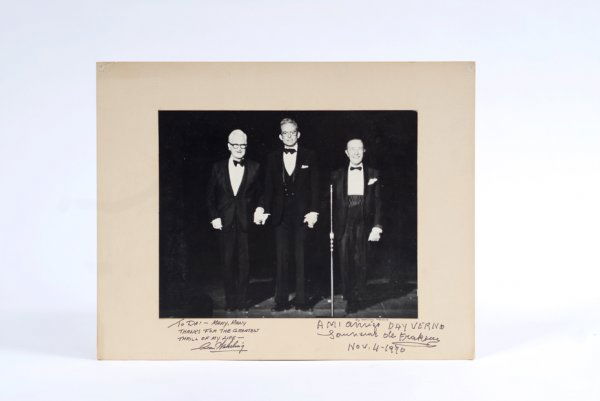 Photograph of Frakson, Alan Wakeling and Dai Vernon: [It's Magic] Full length photograph of Jose Frakson, Alan Wakeling and Dai Vernon. Harley Pence, Los Angeles, 1970. Full-length photograph of the three stars of the 16th annual magic revue-show taken