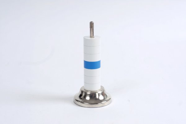 Blue Phantom. Munich, Zauberzentrale, 1985: Blue Phantom. Munich, Zauberzentrale, 1985. Miniature version of Floyd Thayer's popular trick in which a blue checker magically moves up and down in a stack of white checkers. Standing 5 ¾" high, on 