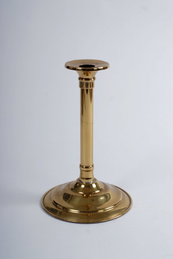 Glass Through Hat. New Haven, Petrie & Lewis: Glass Through Hat. New Haven, Petrie & Lewis, ca. 1930. Brass stand approximating the design of a candlestick, which allows the performer to apparently pass a glass of milk through a borrowed hat. Mec