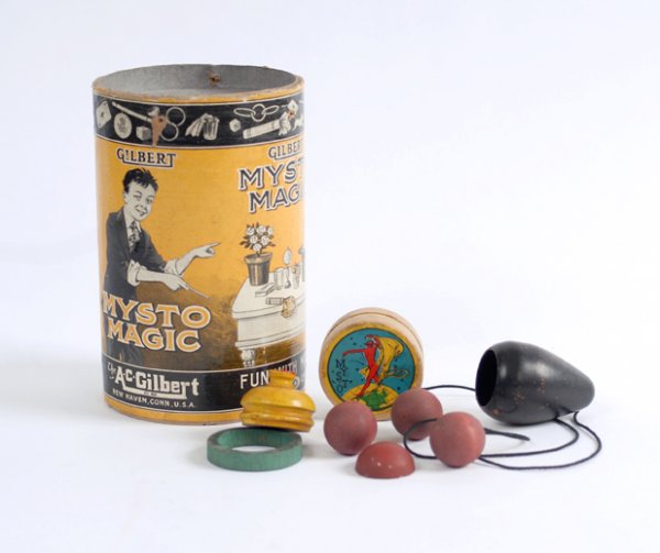 Mysto Magic Parcel Post Magic Set. A.C. Gilbert Co: Mysto Magic Parcel Post Magic Set. New Haven, A.C. Gilbert Co., ca. 1917. Magic set composed of Multiplying Billard Balls, de Kolta Pull, Multiplying Corks, and Mysterious Wooden Ring & Block. In a cu