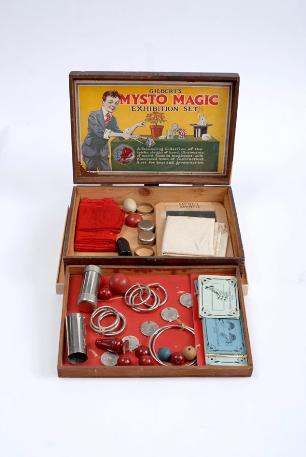 Mysto Magic Set No. 2006. New Haven, A.C. Gilbert: Mysto Magic Set No. 2006. New Haven, A.C. Gilbert Co., ca. 1916. Two layers of props, including billiard balls, marble vase, slates, drumhead tube, coin and card tricks housed in a wooden box with dov