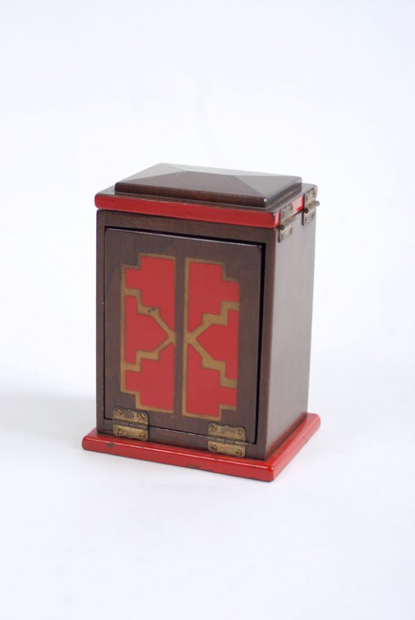 Pixie Box. Owen Magic Supreme ca. 1959: Pixie Box. Los Angeles, Owen Magic Supreme, ca. 1959. A small mahogany box is shown empty by opening front and back doors and the lid, yet a production of silks is made from the interior a moment late