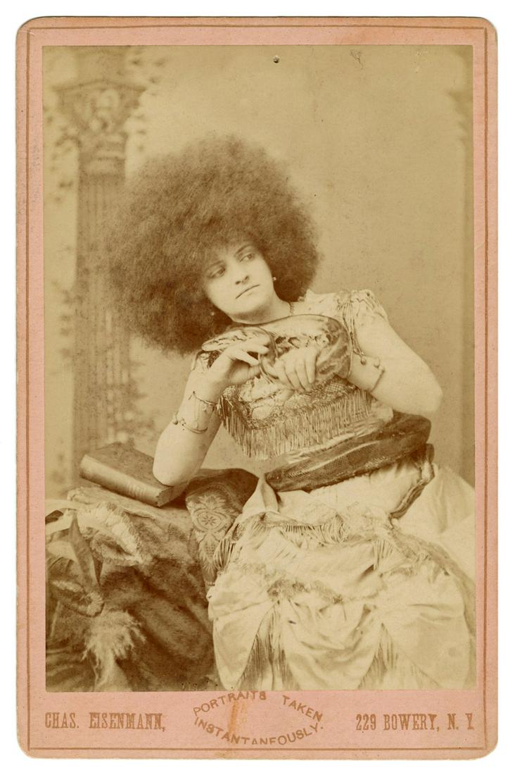 ZOBEDIA, Zoe. Cabinet Photo of Zoe Zobedia, Circassian: ZOBEDIA, Zoe. Cabinet Photo of Zoe Zobedia, Circassian Snake Charmer. New York: Eisenmann, ca. 1900s. Photograph of the Circassian or “moss-haired” beauty with a snake around her wrists an