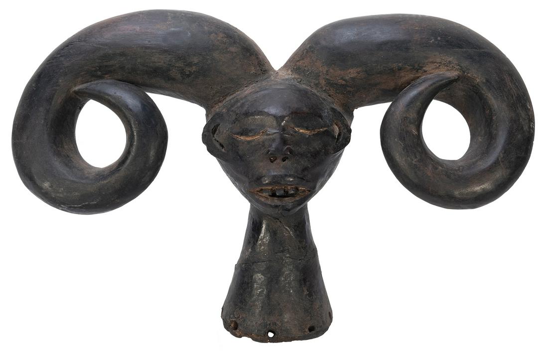 [AFRICAN] Eastern Nigeria Headdress or Cap. Terracotta,: [AFRICAN] Eastern Nigeria Headdress or Cap. Terracotta, wood, leather. Height 12”, length 20”.