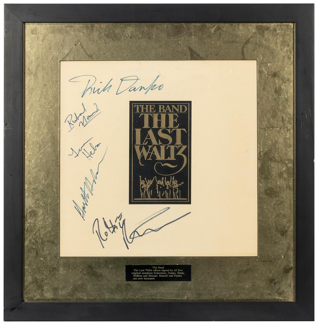 The Band The Last Waltz Album Display. Signed by Robbie: The Band The Last Waltz Album Display. Signed by Robbie Robertson, Rick Danko, Levon Helm, Garth Hudson, and Richard Manuel. Records included. Matted. Framed, 19 ½ x 19”. R&R Auctions Certi