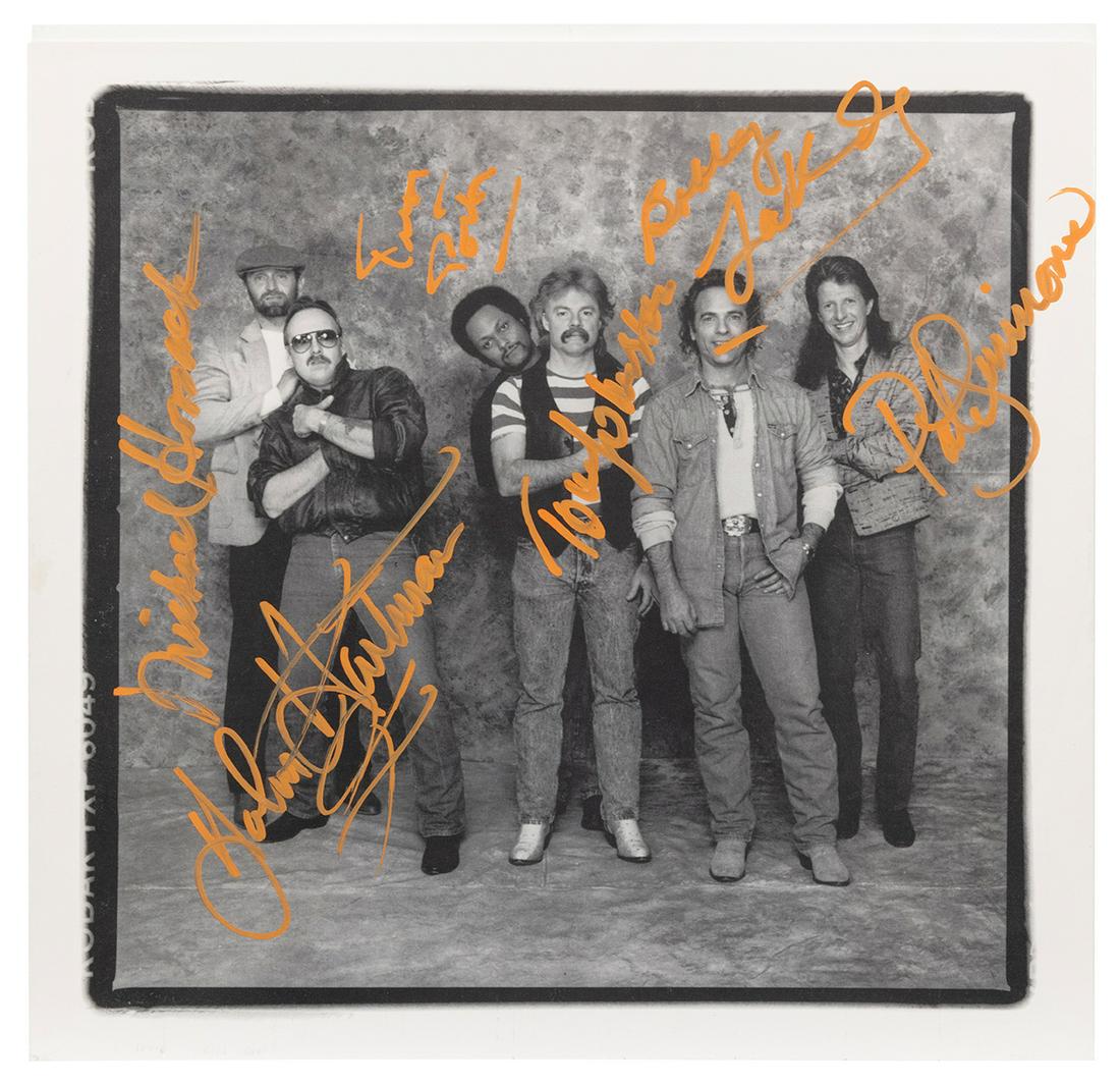 The Doobie Brothers Cycles Album Sleeve. Signed by: The Doobie Brothers Cycles Album Sleeve. Signed by Patrick Simmons, Michael Hossack, John Hartman, Tom Johnston, Bobby LaKind, and Tiran Porter. Includes drumstick from drummer Keith Knudsen with conc