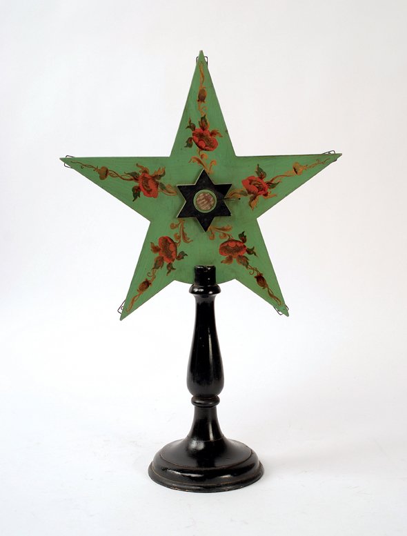 Card Star. Chicago, Okito (Joe Berg), ca. 1946: Card Star. Chicago, Okito (Joe Berg), ca. 1946. A handsomely lacquered wooden star, accented with decals, on the five points of which chosen cards appear at the magician's command. 19 ¾" high with a 
