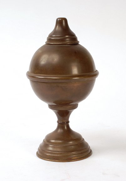 Handkerchief Globe. Maker unknown, ca. 1890: Handkerchief Globe. Maker unknown, ca. 1890. Spun brass vase which allows the performer to transform a quantity of burning cotton batting into crisp, bright silk handkerchiefs, and perform similar eff