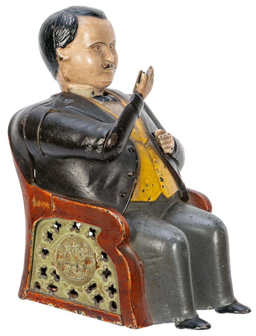 Tammany Hall Bank. Cromwell, CT: J.E. Stephens, 1870s.: Tammany Hall Bank. Cromwell, CT: J.E. Stephens, 1870s. Painted cast iron mechanical bank deposits a coin in the seated politician’s pocket when the arm descends toward it and his head nods. Pale