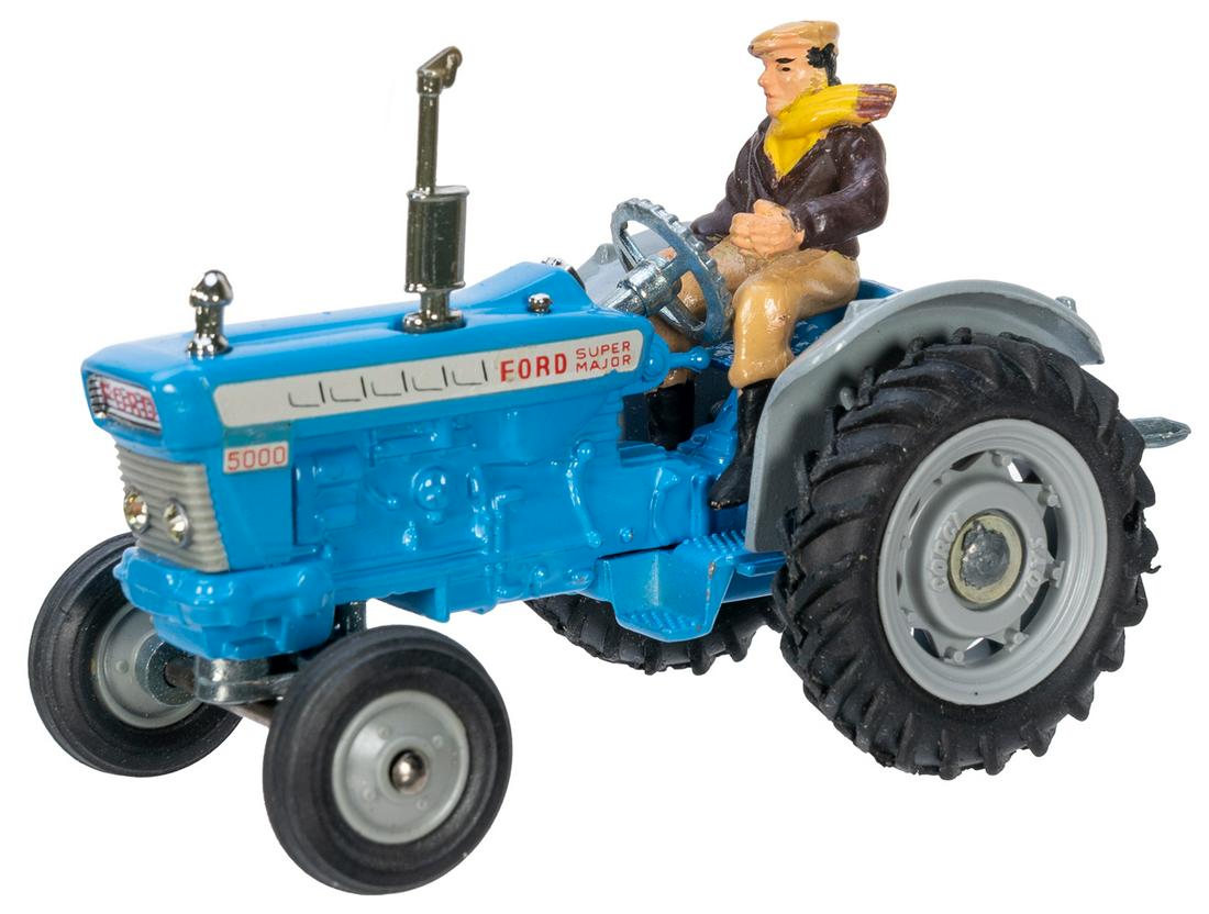 Corgi No. 67 Ford 5000 Tractor. Carded in original box: Corgi No. 67 Ford 5000 Tractor. Carded in original box with driver and folded information sheet. Near fine in a clean and sharp box.