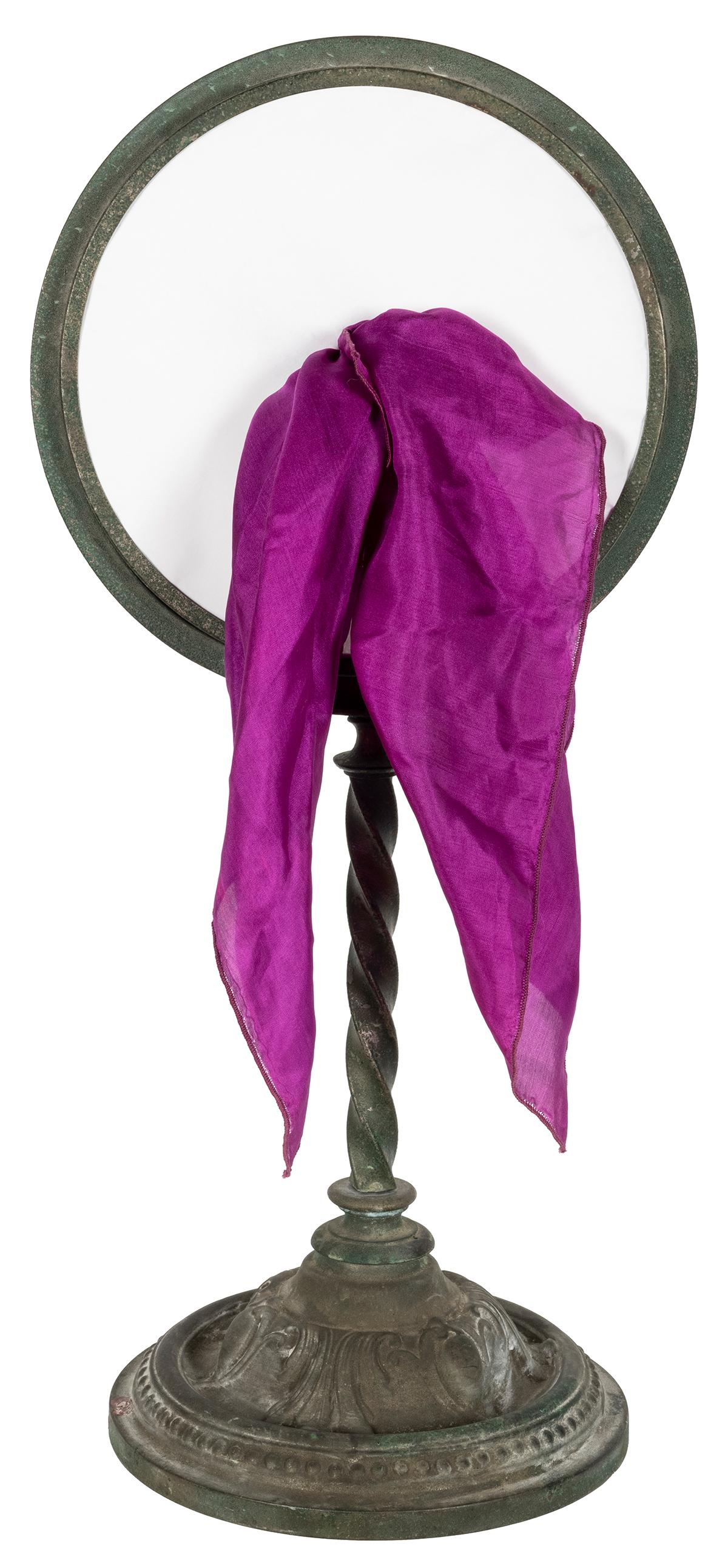 Tambourine Silk Production. Circa 1900. Two metal rings: Tambourine Silk Production. Circa 1900. Two metal rings are converted into an impromptu tambourine by pressing tissue paper between them. The magician then produces silk handkerchiefs, flowers, and ot