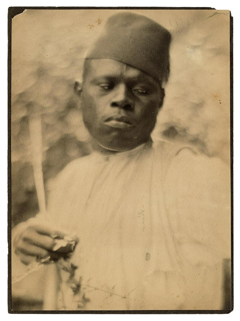 DE MEYER, Baron Adolph, photographer (French/American,: DE MEYER, Baron Adolph, photographer (French/American, 1868â€“1946). Egyptian with a Fez. Circa 1907â€“1911. Original platinum print mounted on original black cardstock with the number â€